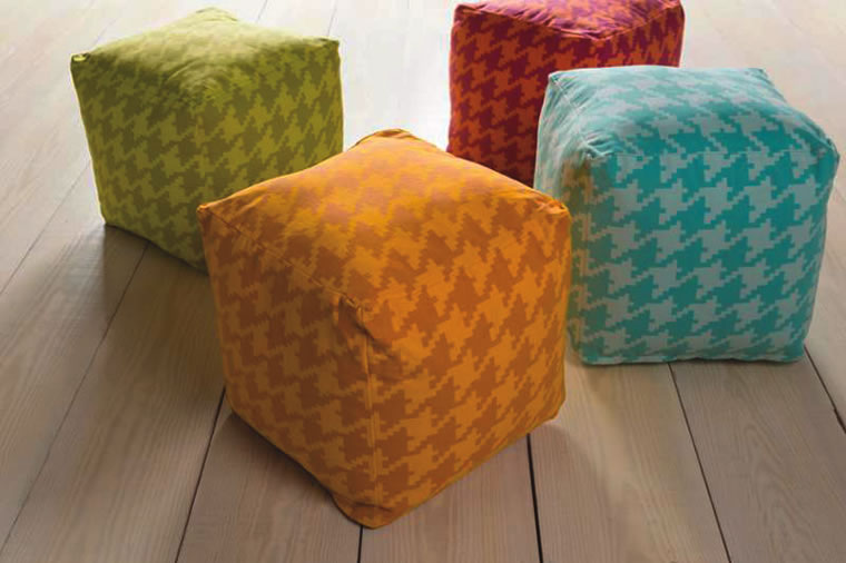 These colorful poufs from Tuvalu Home Environment provide convenient additional seats when entertaining.