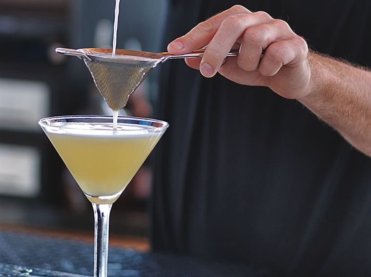 Mozambique Bartender Pouring Durban Pie Martini-CROPPED