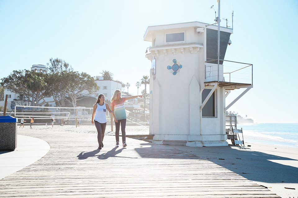 Janelle Naess (right) curates a variety of self-guided, local walking tours through Laguna Beach Walks.