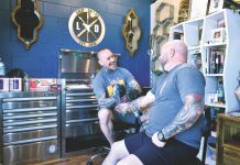 Kalani Storch (left), owner of LO Cal Tattoo