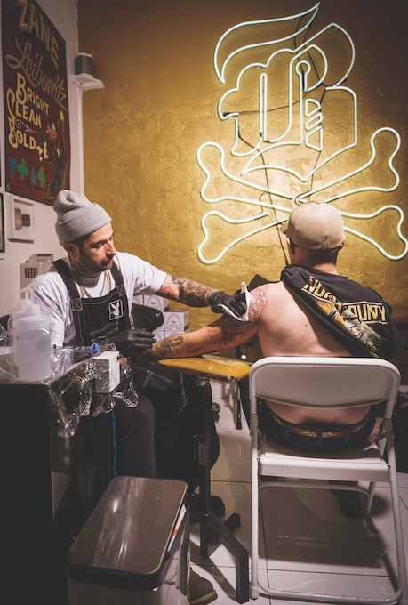 tattooing action shot bare bones_Eric Lampe