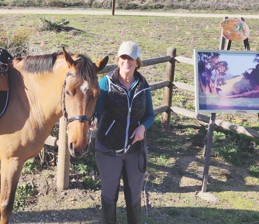 Karin Wyman-Vardaman and horse at entrance to Willow trail_no credit needed header